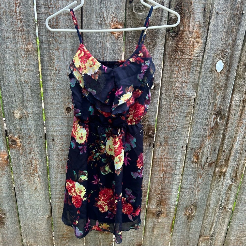 It’s Pink mini dress with spaghetti straps adjustable size is  small